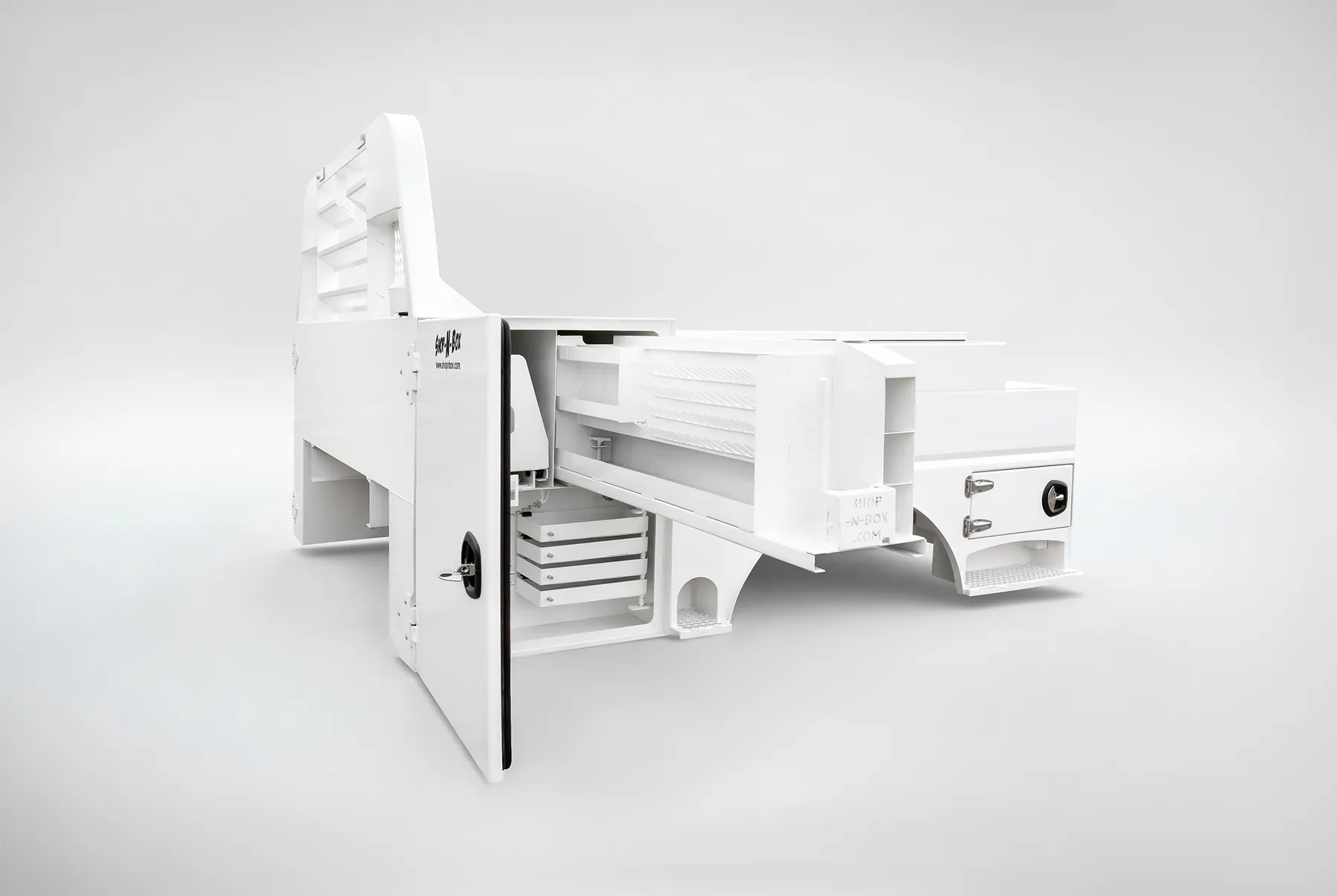 Shop-N-Box™ roll-out truck bed storage system with extended drawer showing modular insert organization