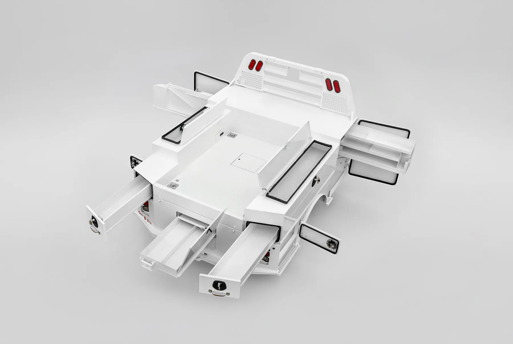Shop-N-Box™ truck bed toolbox system with multiple roll-out drawers open showing organized storage