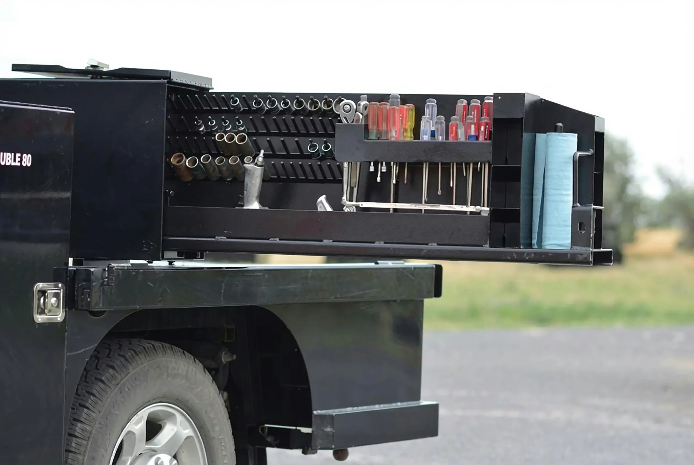 Shop-N-Box™ 1-80 Model flatbed truck toolbox key features showing removable roll-out tool organizer insert